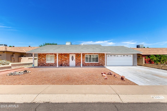 4310 E Sacaton St, Phoenix, AZ 85044 - single story home with concrete driveway, brick siding, an attached garage, and roof with shingles