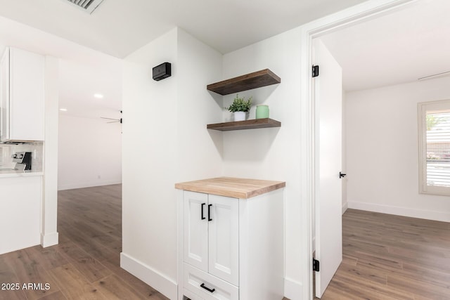 4310 E Sacaton St, Phoenix, AZ 85044 - corridor featuring light wood-style floors, baseboards, recessed lighting, and visible vents
