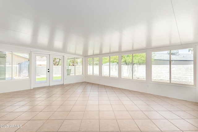 4310 E Sacaton St, Phoenix, AZ 85044 - unfurnished sunroom featuring french doors, tile patterned flooring, and a healthy amount of sunlight