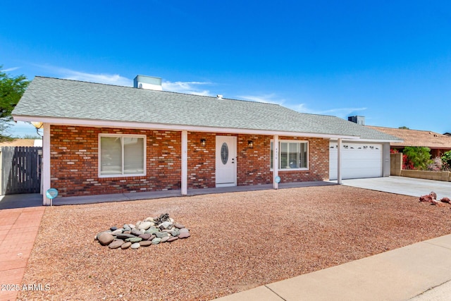 4310 E Sacaton St, Phoenix, AZ 85044 - single story home featuring fence, roof with shingles, an attached garage, brick siding, and driveway
