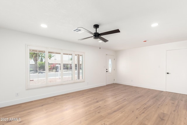 4310 E Sacaton St, Phoenix, AZ 85044 - unfurnished room with ceiling fan, visible vents, and light wood-style floors