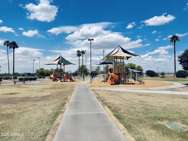 community play area featuring a lawn