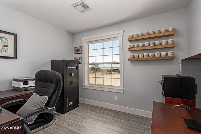32431 N 226th Ave, Wittmann, AZ 85361 - home office featuring baseboards and light wood-type flooring