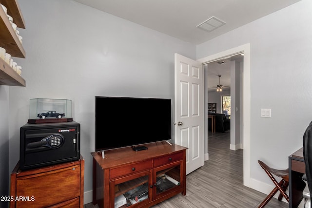 32431 N 226th Ave, Wittmann, AZ 85361 - office with a ceiling fan, baseboards, and light wood-type flooring