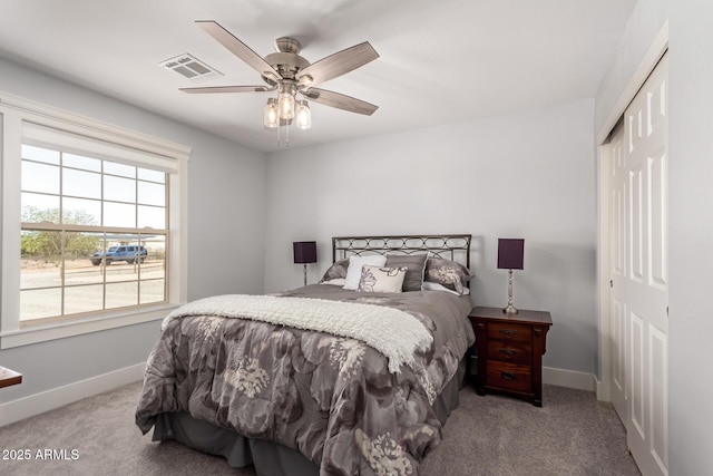 32431 N 226th Ave, Wittmann, AZ 85361 - carpeted bedroom with a closet, baseboards, and ceiling fan