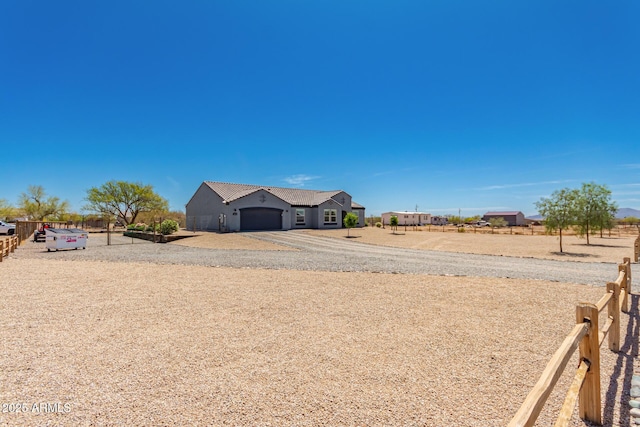 32431 N 226th Ave, Wittmann, AZ 85361 - view of yard with a garage and driveway