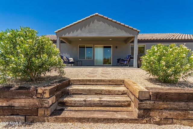 32431 N 226th Ave, Wittmann, AZ 85361 - rear view of property with a patio, stucco siding, and a tile roof