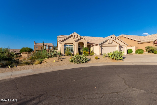 view of front of property featuring a garage