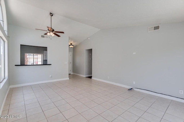 4330 E Desert Trumpet Rd, Phoenix, AZ 85044 - unfurnished room featuring a ceiling fan, vaulted ceiling, light tile patterned floors, and baseboards