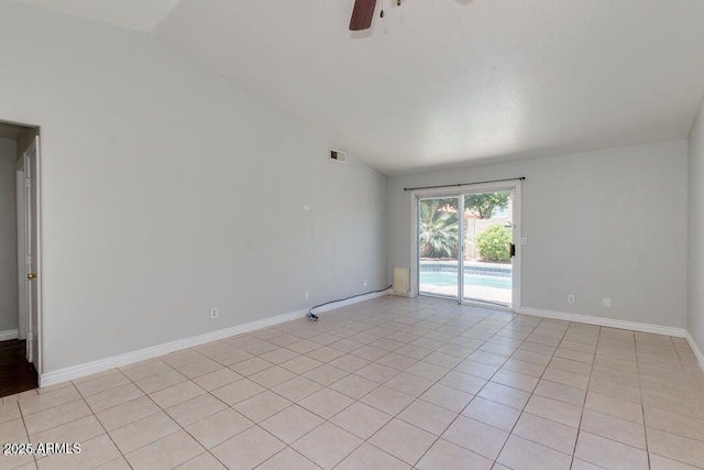 4330 E Desert Trumpet Rd, Phoenix, AZ 85044 - spare room featuring lofted ceiling, ceiling fan, light tile patterned floors, and baseboards
