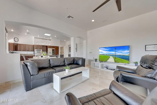 living room featuring ceiling fan