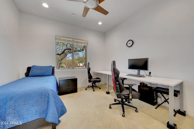 bedroom featuring vaulted ceiling, ceiling fan, and light colored carpet