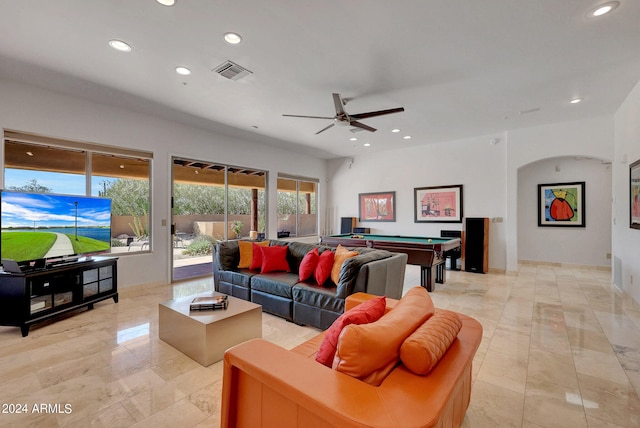 living room featuring ceiling fan and billiards