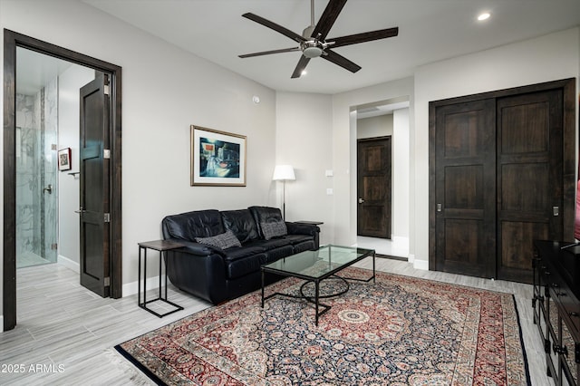 living room with ceiling fan