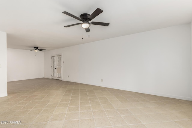 unfurnished room featuring ceiling fan