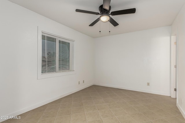 unfurnished room with ceiling fan