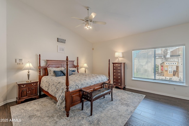 bedroom featuring baseboards, vaulted ceiling, wood finished floors, and a ceiling fan