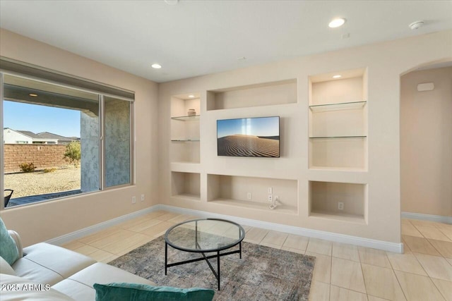 tiled living room with built in features