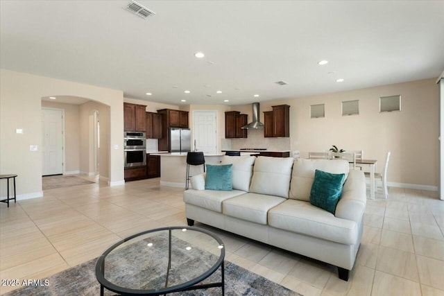 living room featuring light tile patterned floors