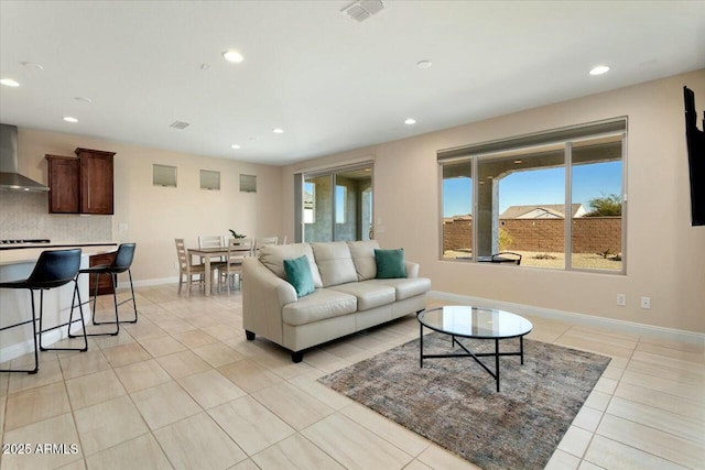 living room featuring light tile patterned floors