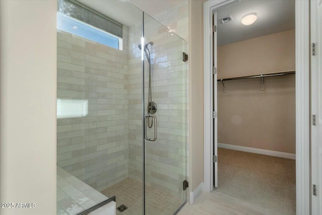 bathroom featuring walk in shower