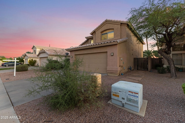 view of front of home with a garage