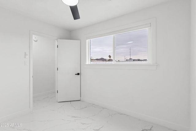 spare room featuring ceiling fan