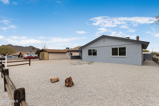 view of front of property featuring a mountain view