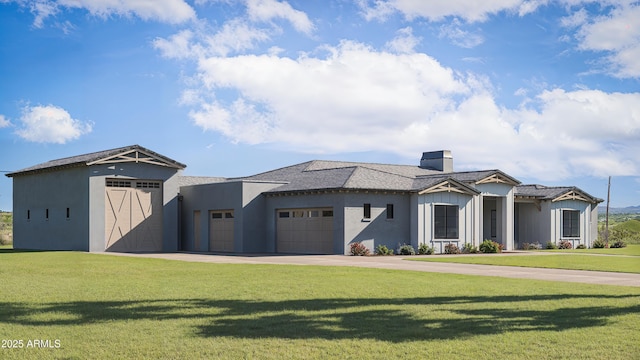 modern farmhouse with driveway, a garage, and a front yard