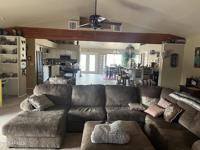 living room featuring lofted ceiling and ceiling fan