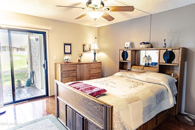 bedroom featuring access to exterior, hardwood / wood-style floors, a textured ceiling, and ceiling fan