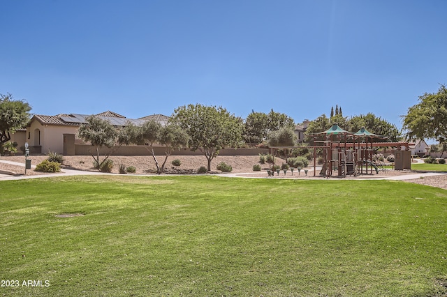 view of yard featuring playground community