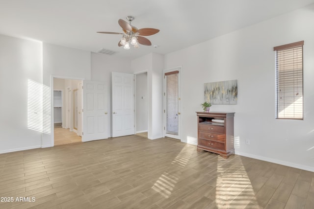 unfurnished bedroom featuring ceiling fan and light hardwood / wood-style floors