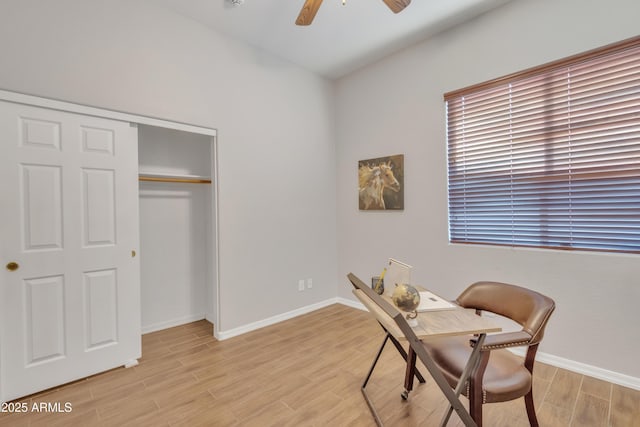 office space featuring ceiling fan and light wood-type flooring