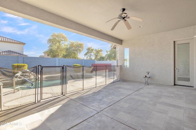 view of patio featuring ceiling fan