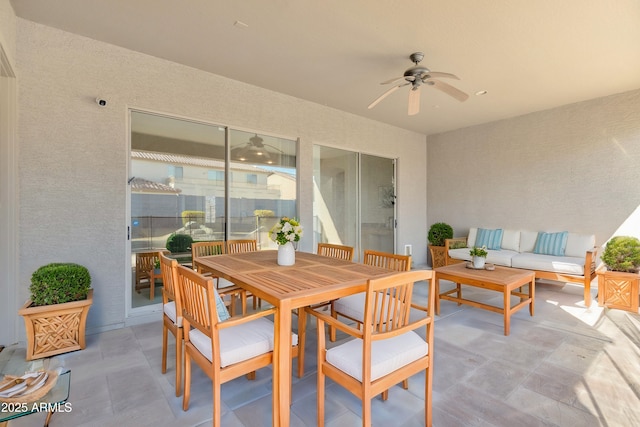 view of patio with outdoor lounge area and ceiling fan