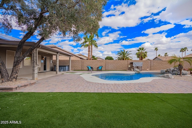 view of pool featuring a lawn, a patio area, a fenced backyard, and a fenced in pool