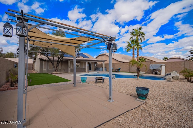 view of patio with a fenced in pool and a fenced backyard