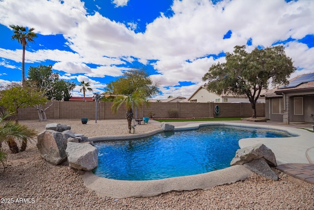 view of pool featuring a fenced in pool, a fenced backyard, and a patio