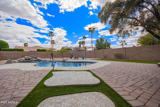 view of pool featuring a patio area, a fenced backyard, and a fenced in pool