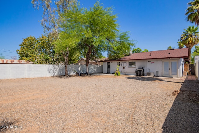 rear view of house with a patio area