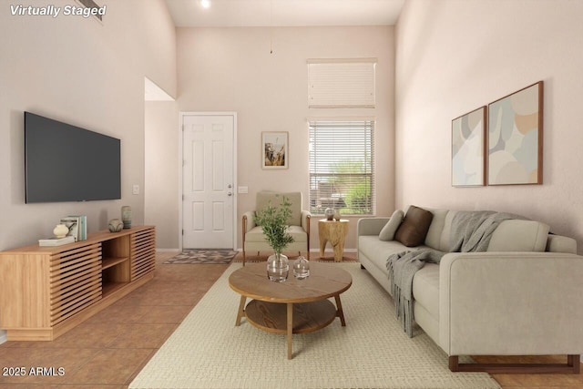 42424 N Gavilan Peak Pkwy Unit 57104, Anthem, AZ 85086 - living room featuring a high ceiling and light tile patterned flooring