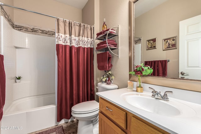 full bathroom featuring vanity, toilet, and shower / bath combination with curtain