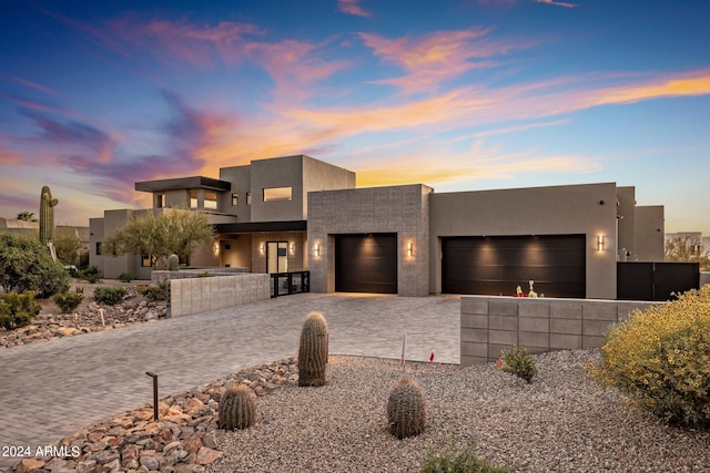 southwest-style home with a garage