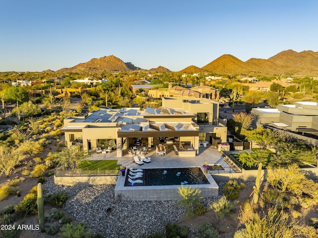 bird's eye view with a mountain view