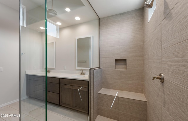 full bath with tile patterned flooring, double vanity, recessed lighting, and walk in shower