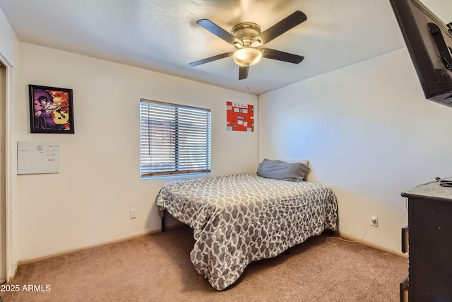 bedroom with light carpet and ceiling fan