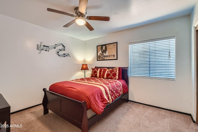 bedroom with light colored carpet and ceiling fan