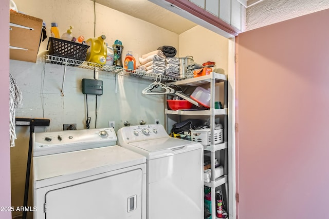 laundry room with independent washer and dryer