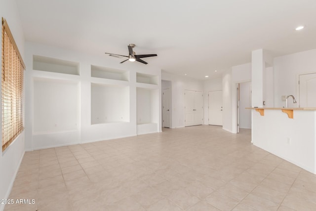 unfurnished living room with recessed lighting and a ceiling fan